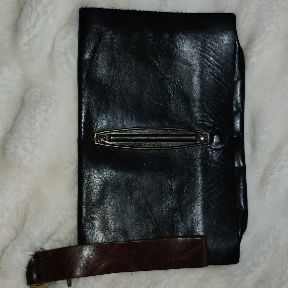 Leather Rebel design Metal Hardware Wristlet Clutch Excellent condition